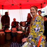 Simon Lewis playing djembe at Run with the Rhythm